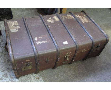 Vintage canvas wooden and metal banded travelling trunk.