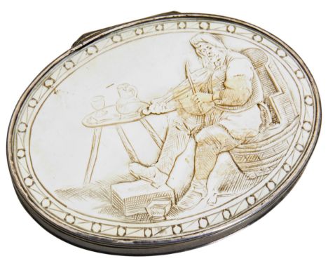 AN OVAL SNUFF BOX WITH CARVED MOTHER OF PEARL LID, C.1730. The lid is decorated with a tavern scene of fiddle player, the bas