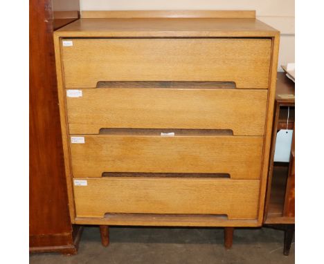 A 1960's light wood G-plan design chest of four drawers raised on rounded tapering supports, 77.5cm wide x 48cm deep x 93cm h