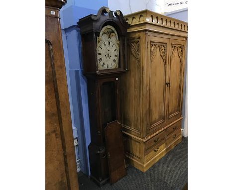 A 19th Century oak longcase clock, by John Ashton of Leek, with eight day movement, strike action, sun and moon phase dial an