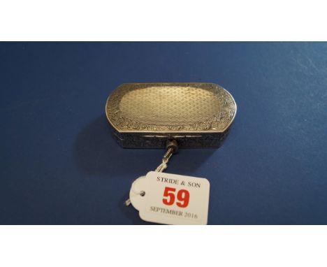 A Continental .900 makeup box, having lipstick holder to centre and inset mirror, with engine turned and floral chased decora