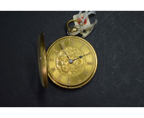 An 18ct gold English lever fusee pocket watch, having engine turned and chased 3.8cm dial decorated Roman numerals, movement 