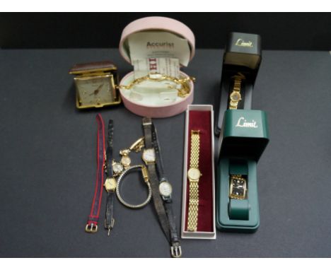 An Avia 9ct gold ladies wristwatch on plated bracelet; together with various other ladies wristwatches and a travelling clock