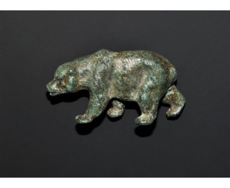 "20th century AD. A bronze figurine of an advancing bear with head lowered. 97 grams, 65mm (2 1/2"). Property of a gentleman;