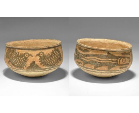 "3300-1700 BC. A squat terracotta cup with flared rim, painted pair of opposed birds and a fish. 111 grams, 98mm (4"). See Sa