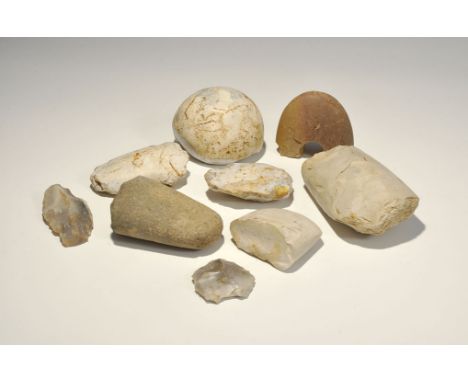 "Neolithic, 5th-2nd millenium BC. A mixed group comprising: a fragment of a large polished flint axe, broken in antiquity, tr