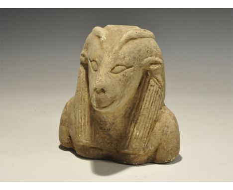 "20th century AD. A ceramic head of Soker with antelope features, tripartite wig, socket to the upper face. 1.4 kg, 15cm (6")