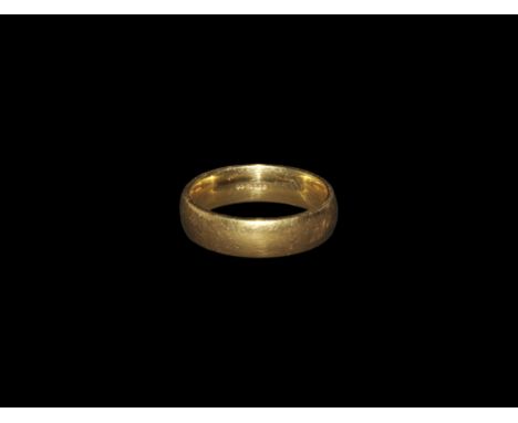 "Hallmarked 2001.. A plain gold barrel-shaped hoop with mark to the inner face of 'EF' within a double lozenge, '750', rosett