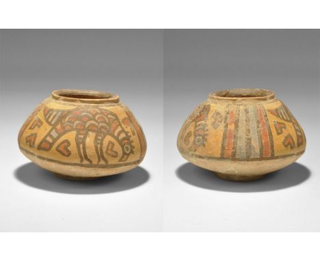 "3300-1700 BC. A squat terracotta jar with chamfered rim, polychrome birds to the shoulder. 222 grams, 11.5cm (4 1/2"). See S