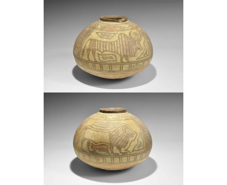 "3300-1700 BC. A squat terracotta jar with flared rim, band of polychrome geometric panels above a lion and a bull with a rin