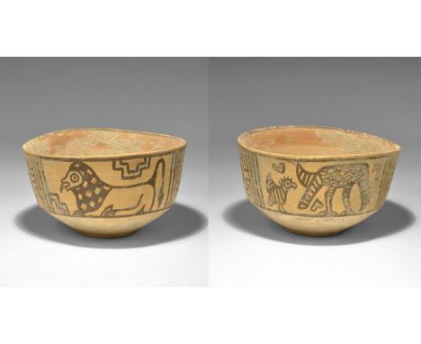 "3300-1700 BC. A terracotta carinated cup with polychrome panels of geometric ornament, birds and a lion. 158 grams, 12cm (4 