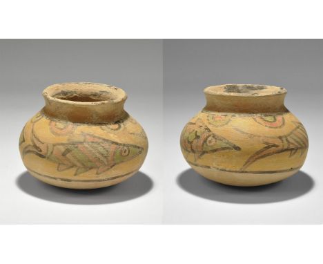 "3300-1700 BC. A squat terracotta jar with raised rim, band of polychrome fish and swags to the shoulder. 210 grams, 92mm (3 