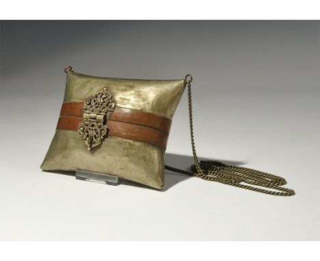 "19th century AD. A velvet-lined bronze purse with hinged lid, arabesque plaques with clasp, lateral loops with suspension ch