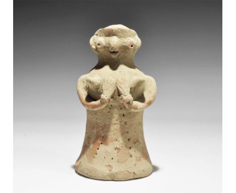 "3300-1700 BC. A bell-shaped ceramic figurine with globular head; applied arms supporting the breasts, applied facial details