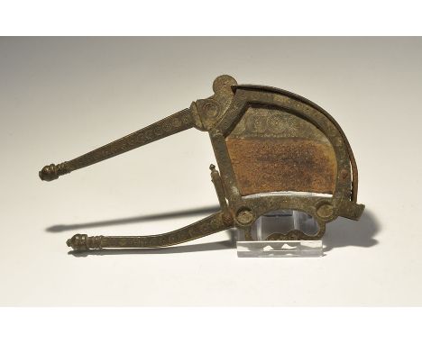 "19th century AD or earlier. A bronze cutter comprising the bronze frame and handle, iron spring, bronze blade with integral 