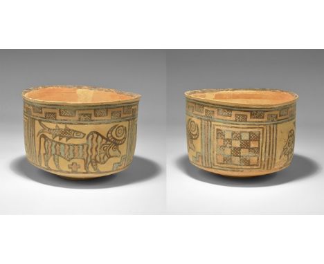 "3300-1700 BC. A terracotta bowl with band of polychrome hatched panels to the rim, geometric panels to the sidewall with cro