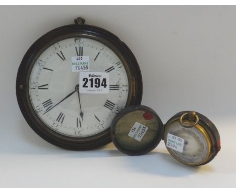 A Sedan clock, 19th century with white enamel dial in a turned mahogany case (14.5cm diameter) and a brass cased pocket barom