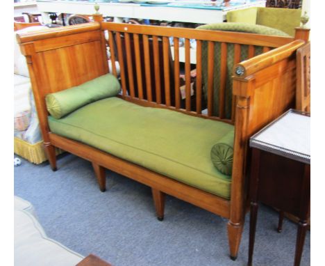 A Biedermeier gilt metal mounted fruitwood square back sofa with tapering supports, 165cm wide. 