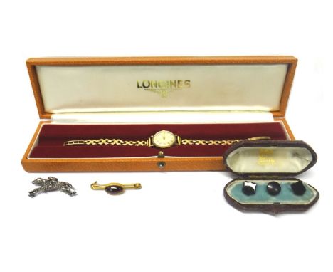 A ladies 9ct gold circular cased Longines wristwatch, on a 9ct gold bracelet, with a foldover clasp, with a case, a ladies si