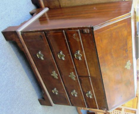 An 18th century feather banded walnut bureau with welled interior over two short and two long graduated drawers on bracket fe