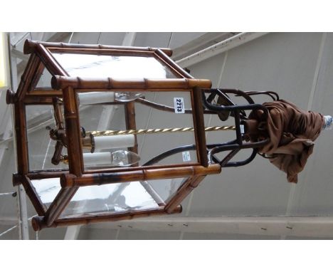 A bamboo hall lantern, early 20th century of hexagonal form with internal three point light fitment, 60cm high. 