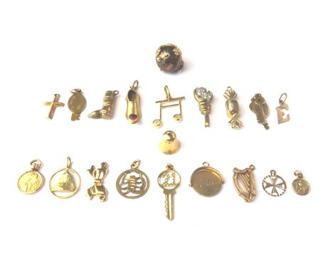 A Masonic folding spherical pendant fob, opening to reveal a variety of engraved Masonic symbols and nineteen mostly 9ct gold