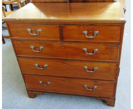 A George III mahogany chest of two short and three long graduated drawers, on bracket feet, 92cm wide.