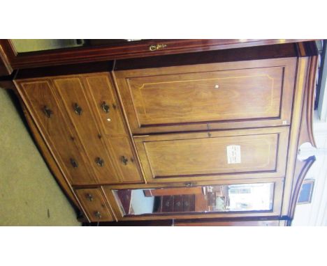 A late 19th century satinwood banded mahogany breakfront compactum wardrobe on bracket feet, 190cm wide x 217cm high. 