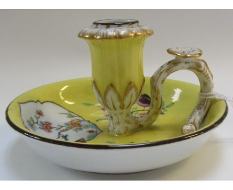 A Meissen Kakiemon decorated yellow ground chamber stick, late 19th/early 20th century, blue crossed swords mark, 12cm diamet