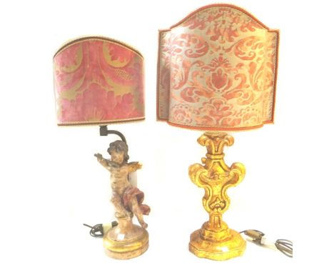 An Italian carved polychrome decorated figure of a putto playing the flute, (fitted as a lamp) and a gilt altar stick fitted 