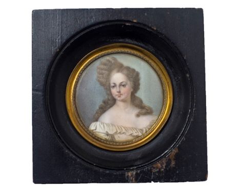 Late 19th Century Continental School, portrait miniature of a lady, with low cut dress, watercolour on ivory, 6.8cms diameter