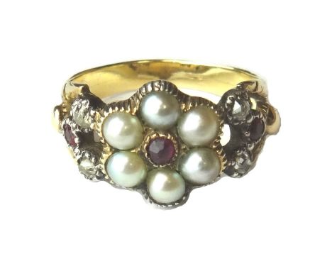 A gold, diamond, ruby and half pearl set cluster ring, mounted with a central ruby, within a surround of six half pearls and 