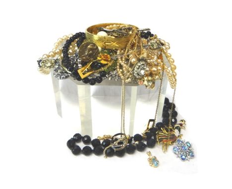 Mostly silver jewellery, comprising; three bangles, a charm bracelet, a wide bracelet, an oval pendant locket, an agate set r