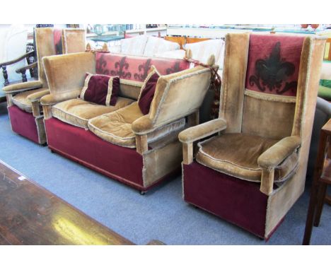 An early 20th century Knole sofa, 175cm wide, together with a pair of matching high back chairs.