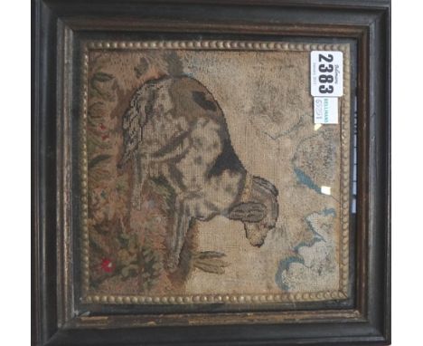 An early Victorian needlework picture of a hound with a wool work foliate foreground, framed and glazed, 17cm x 17cm, and Art