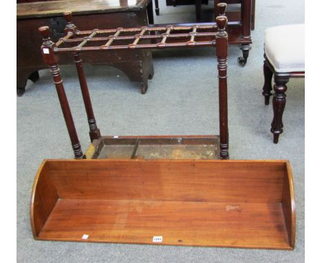 A 19th century mahogany open book trough, 92cm wide, together with a twelve division turned mahogany stick stand, 63cm wide. 
