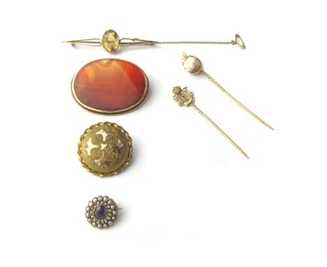 A gold mounted banded agate cameo set stick pin, carved as the portrait of a lady, a gold stick pin, designed as a monogram a