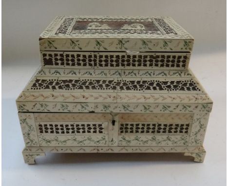 An Anglo-Indian bone veneered box, in the Vizagapatam style, 19th century, with two tiered hinged lids, pierced trellis work 