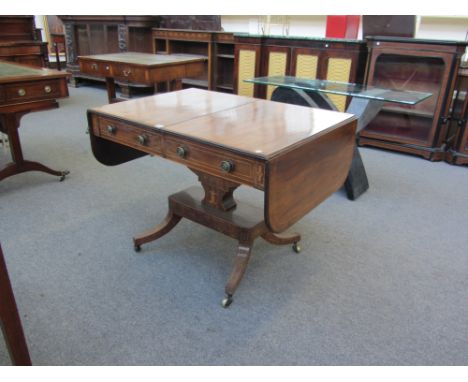 A Regency mahogany two drawer sofa table on crescent mount and four downswept supports, 100cm wide. 