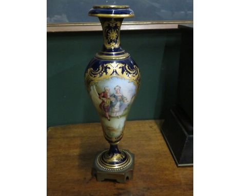PAIR OF CONTINENTAL CERAMIC VASES WITH COBALT BLUE GROUND GILDED WITH PANELS OF HANDPAINTED FIGURES AND WITH COVERS 