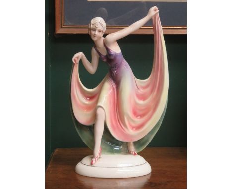 CONTINENTAL STYLE ART DECO GLAZED CERAMIC FIGURE OF A LADY, APPROXIMATELY 31cm HIGH 