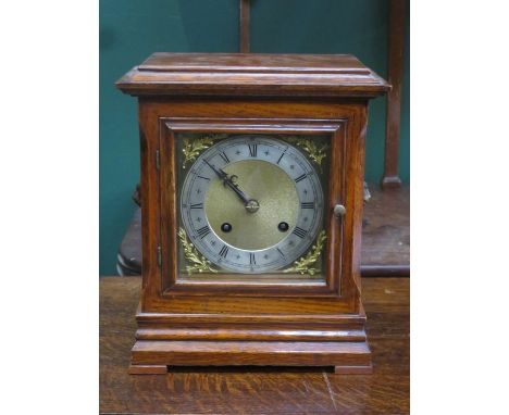 OAK CASED BRACKET CLOCK WITH ORMOLU MOUNTED GILT METAL DIAL