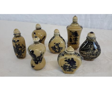 A collection of seven oriental ceramic perfume bottles 