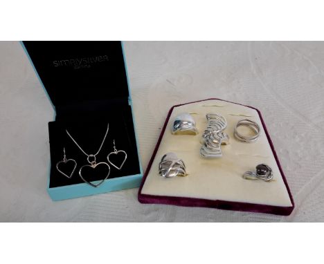 Simply silver art pendant chain & matching earrings & 5 various silver rings 