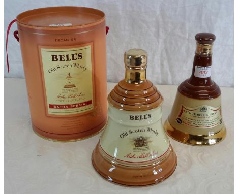 Bells old Scotch whisky decanter full & sealed with box, together with an additional Bells decanter full & sealed 
