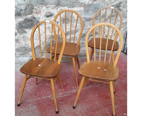 Set of 4 ercol hoop back light wood chairs 