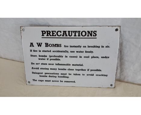 Vintage enamel "Precautions" A W Bombs sign. 20.5 x 30.5cm