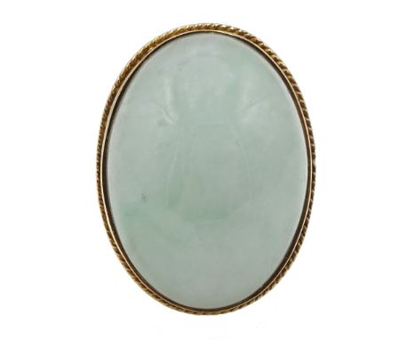 9ct gold cabochon jade ring, hallmarked Condition Report approx 12.8gm, size O, overall head size 24mm x 20mm Click here for 