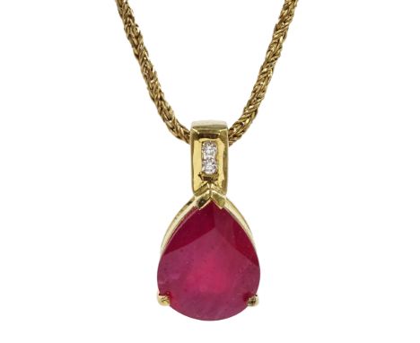 18ct gold pear shaped ruby and diamond pendant, on 9ct gold chain both hallmarked Condition Report Pendant approx 3gm, length