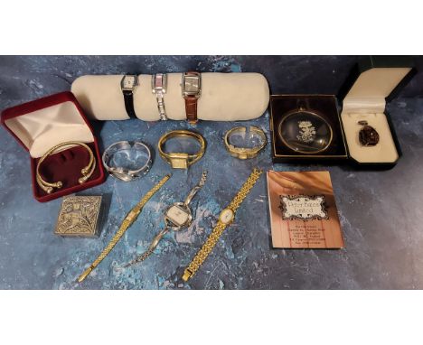 A vintage Tenor gold plated lady's bangle watch, Swiss 17 jewel movement, silvered dial, gold coloured baton &amp; Arabic num